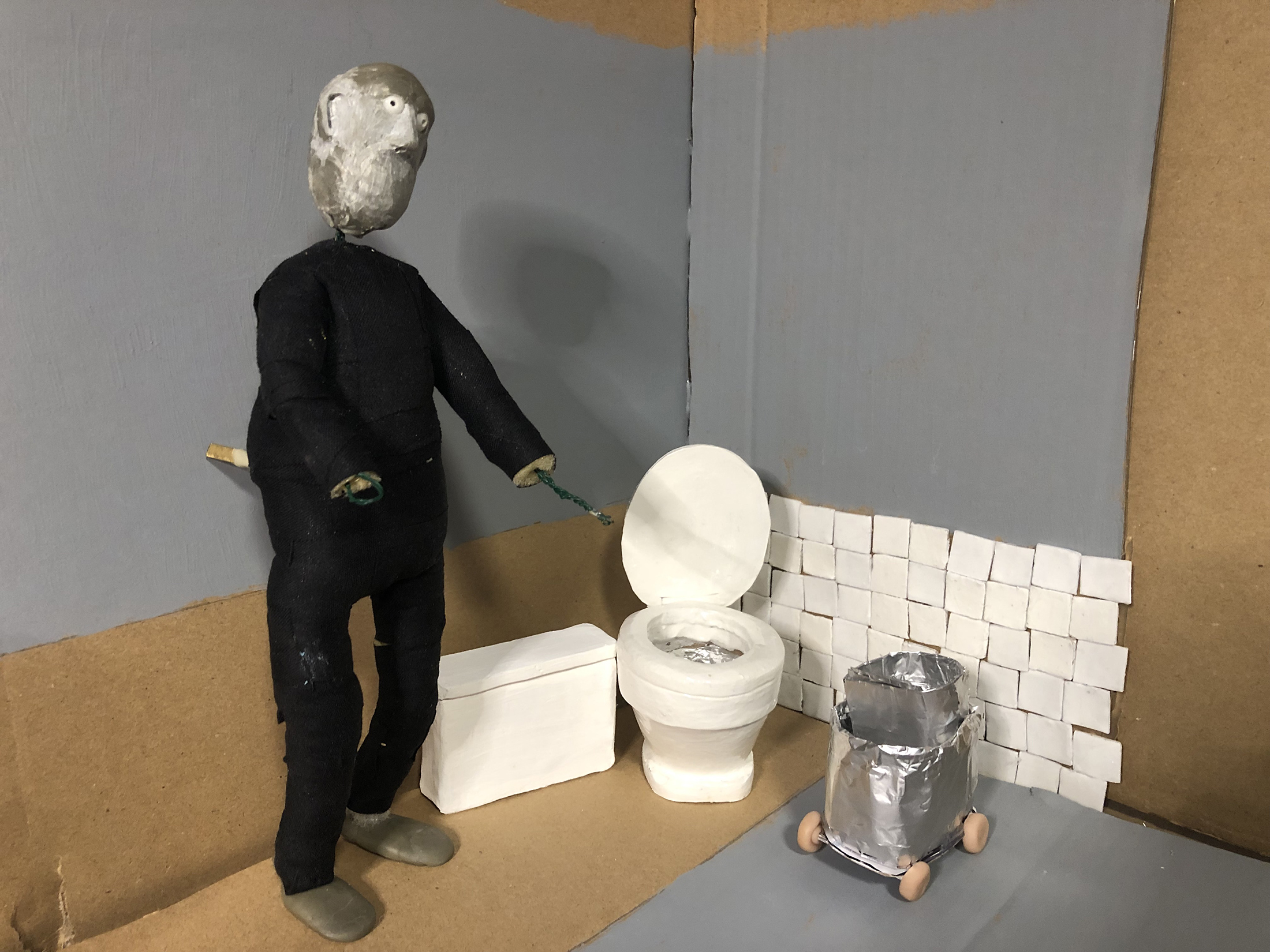 Character sculpting and painting for The Janitor, a student project by Juan Carlos at The Clayman Studio animation workshops in Vancouver