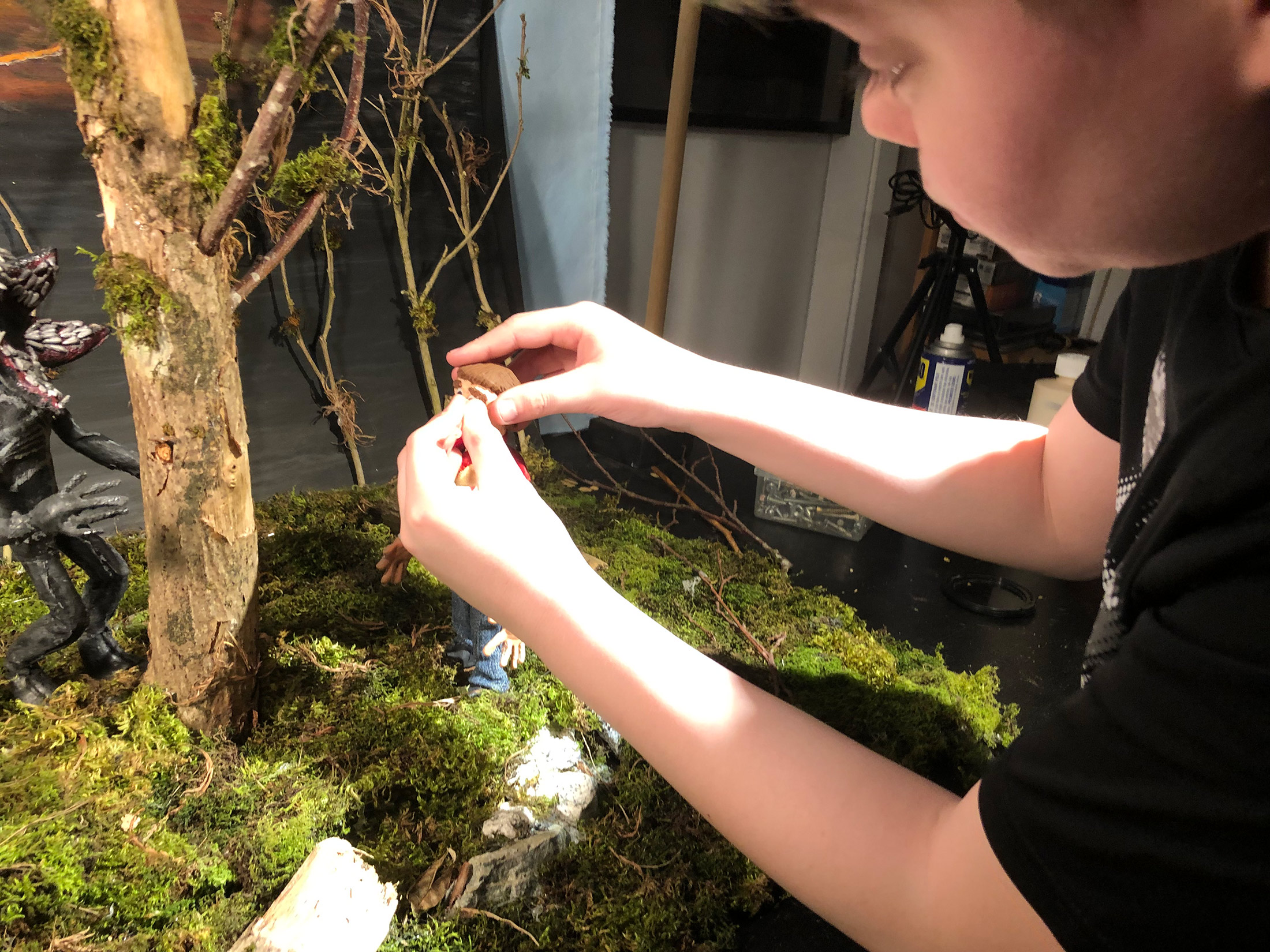 Animation student Ryder develops his Demogorgon puppet, a stop motion animation project created during the workshop by The Clayman Studio. The images captures the hands-on creative process of character design and animation production.