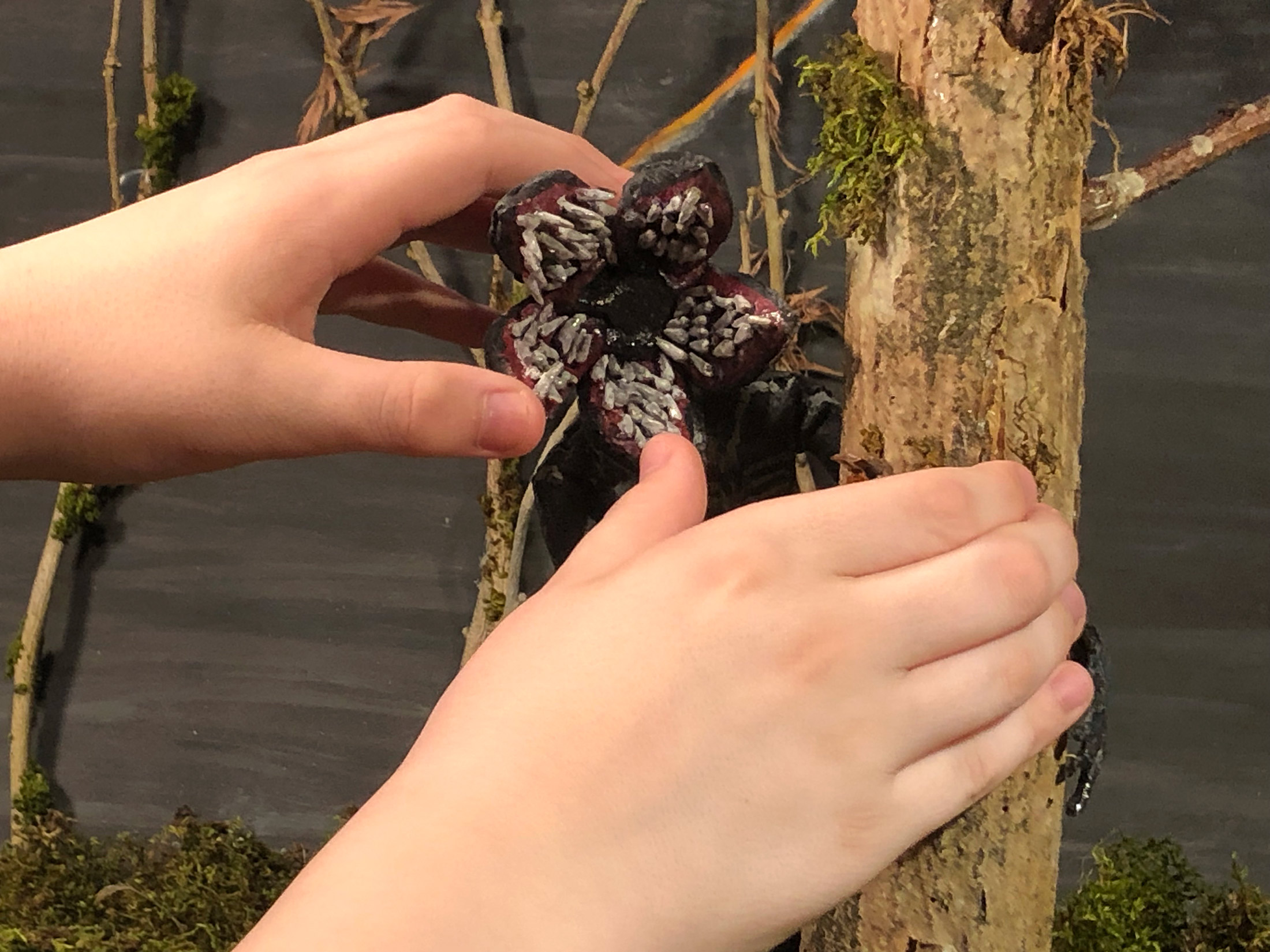 Animation student Ryder develops his Demogorgon puppet, a stop motion animation project created during the workshop by The Clayman Studio. The images captures the hands-on creative process of character design and animation production.